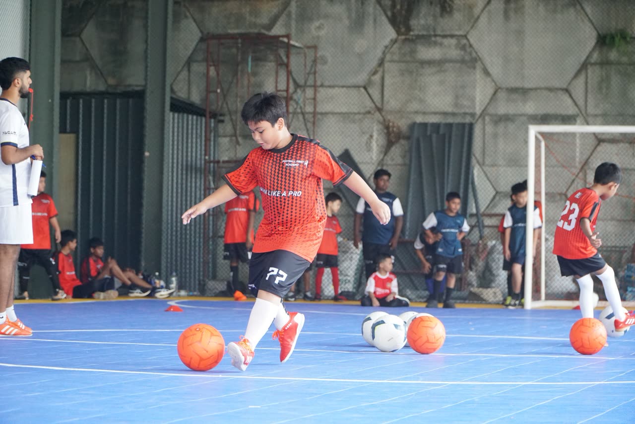 Young football players training at Football First Academy in Malaysia